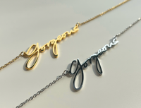 18k gold plated script necklace with word Gorgeous 